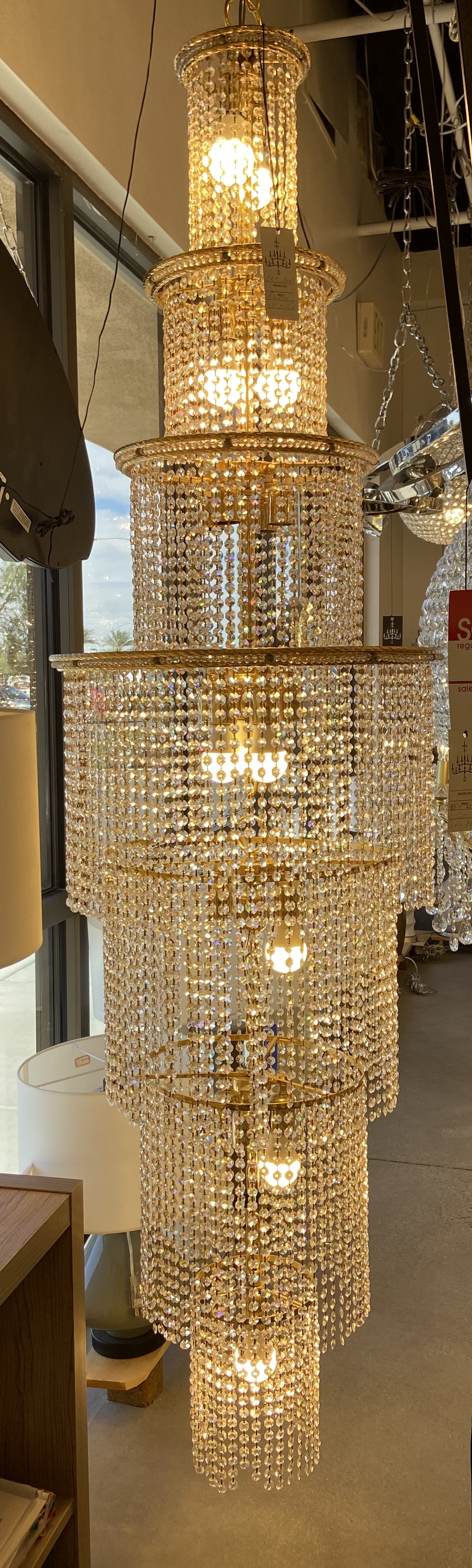 Multi Tiered gold frame chandelier with cascading crystals